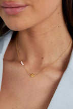 collana di perle floreali