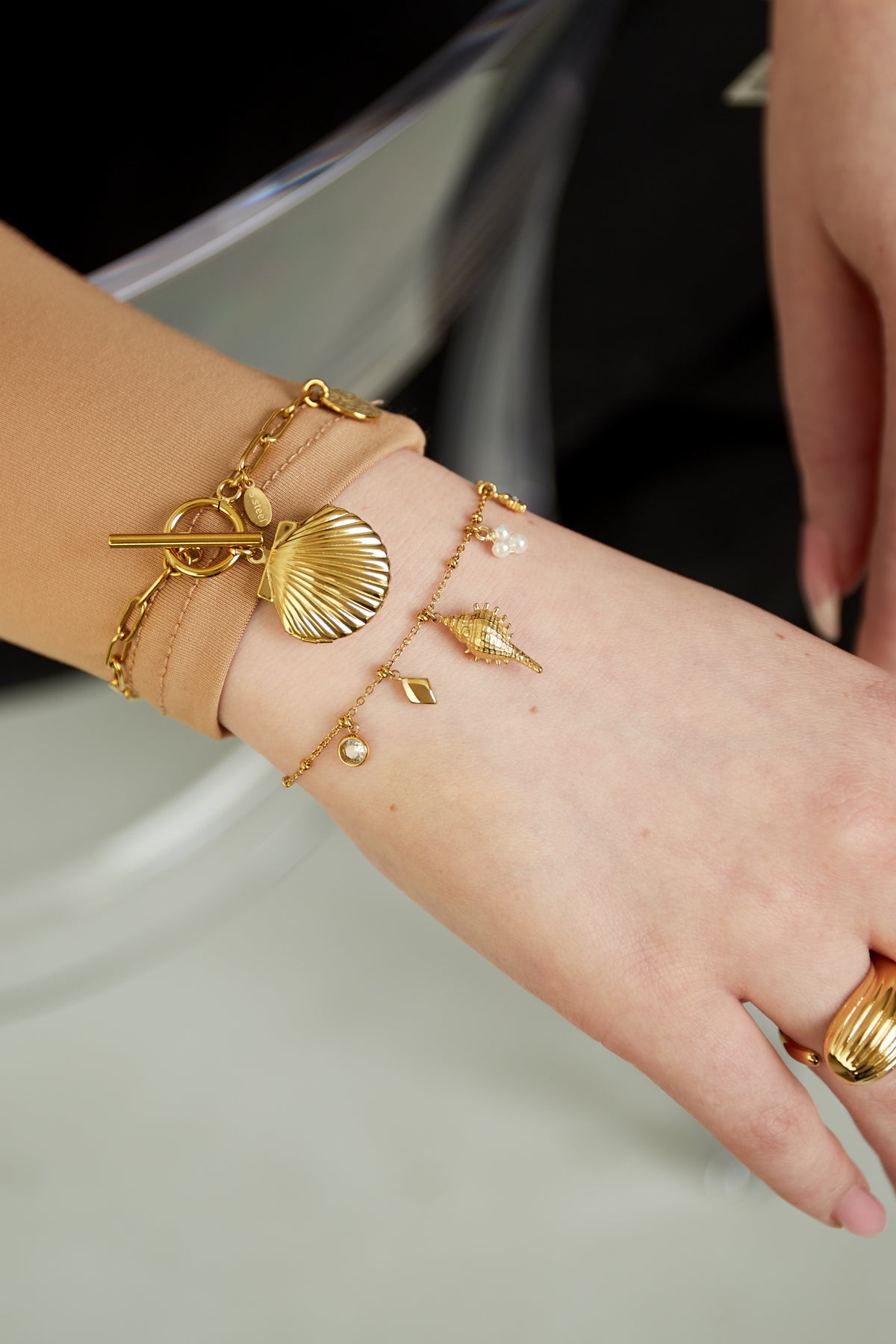 bracciale con ciondolo conchiglia