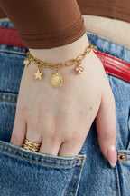 bracciale con ciondoli celestiali