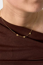 Collana con perline e cuori con pietra