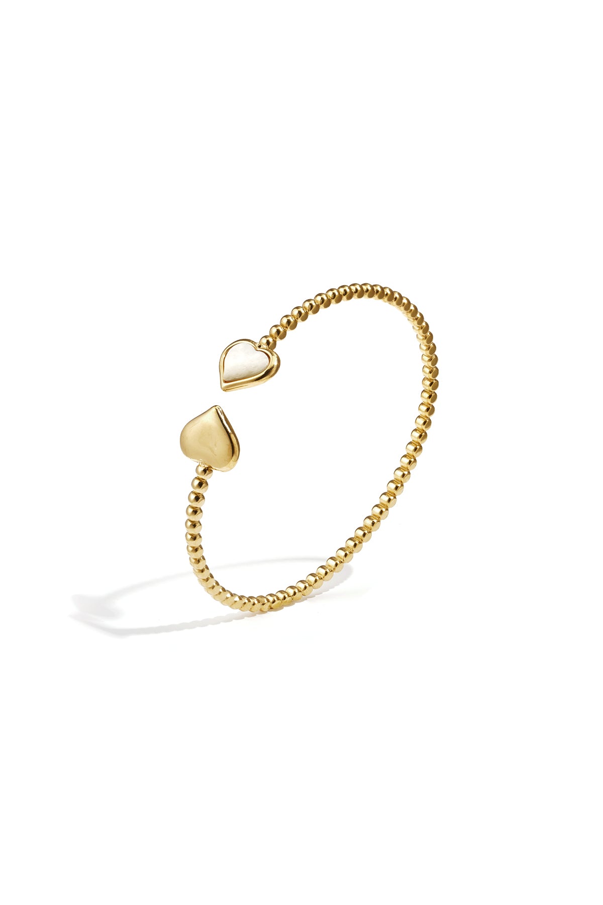 Bracciale a pois simmetrici con estremità decorate.