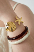 Bracciale con conchiglie e stelle marine