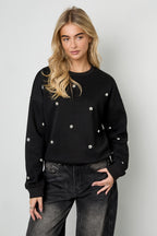 Maglione con borchie