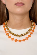 Collana di perline con perline a forma di trifoglio