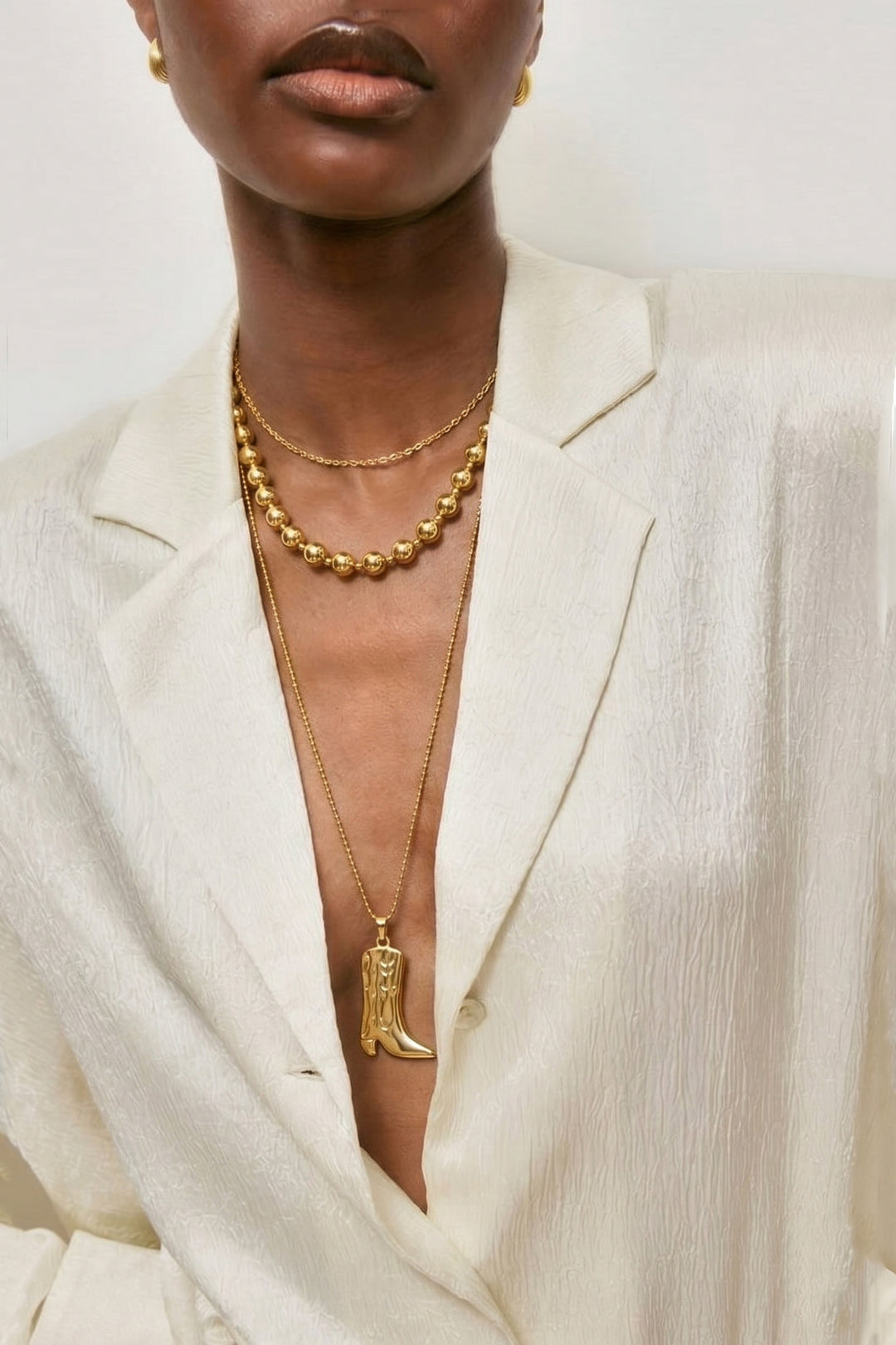Collana lunga con stivale da cowboy