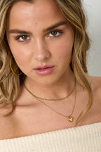 Collana a strati con ciondolo a cuore