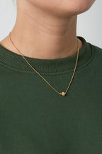 Collana minimalista con un quadrifoglio