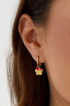 Orecchini con fiore pendente e perline