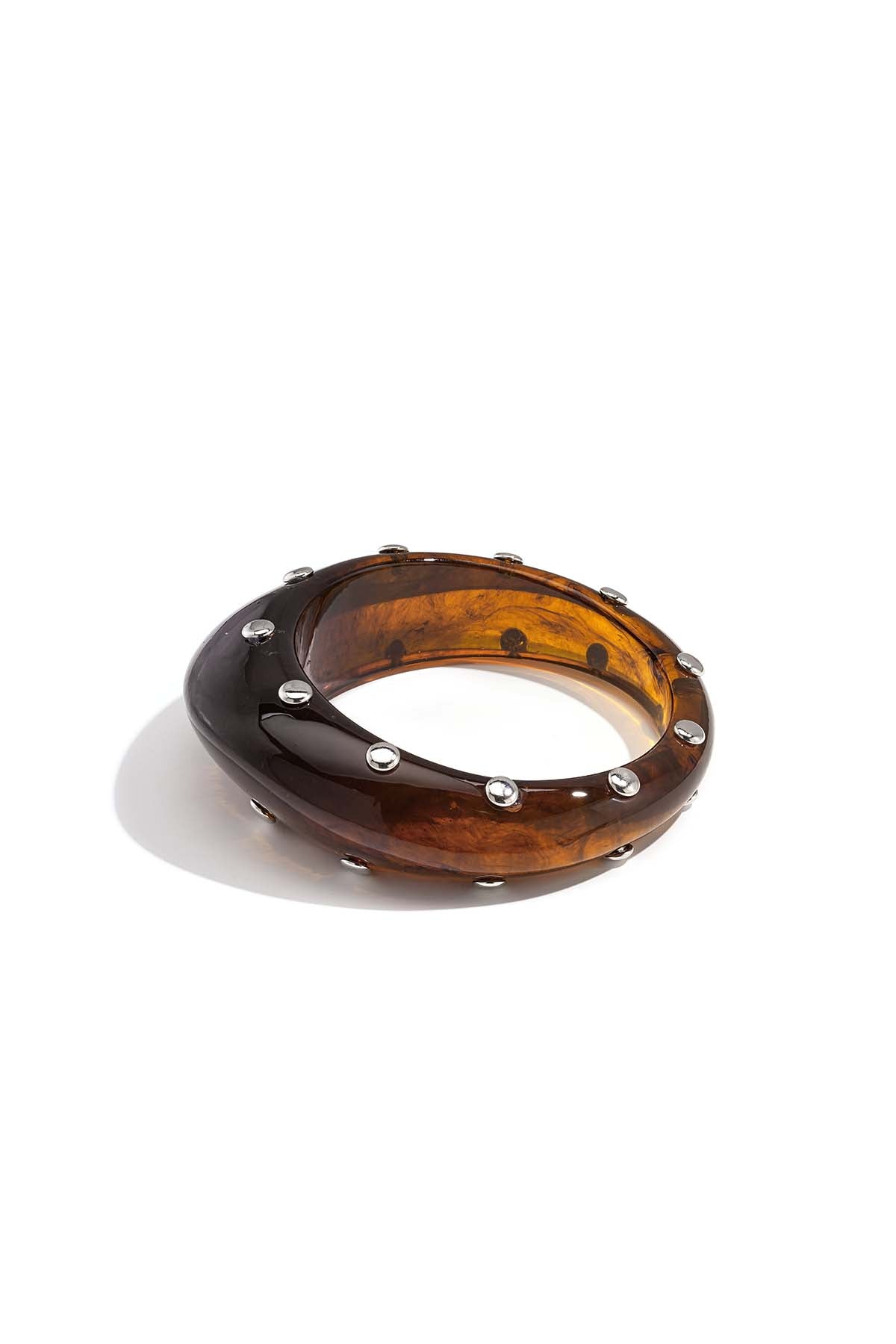 Bracciale rigido in resina con borchie