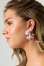 Orecchini a cerchio realizzati con paillettes e perline