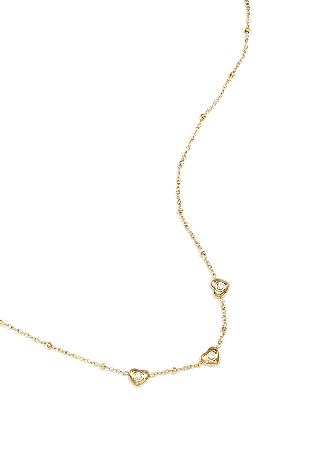 Collana con perline e cuori con pietra