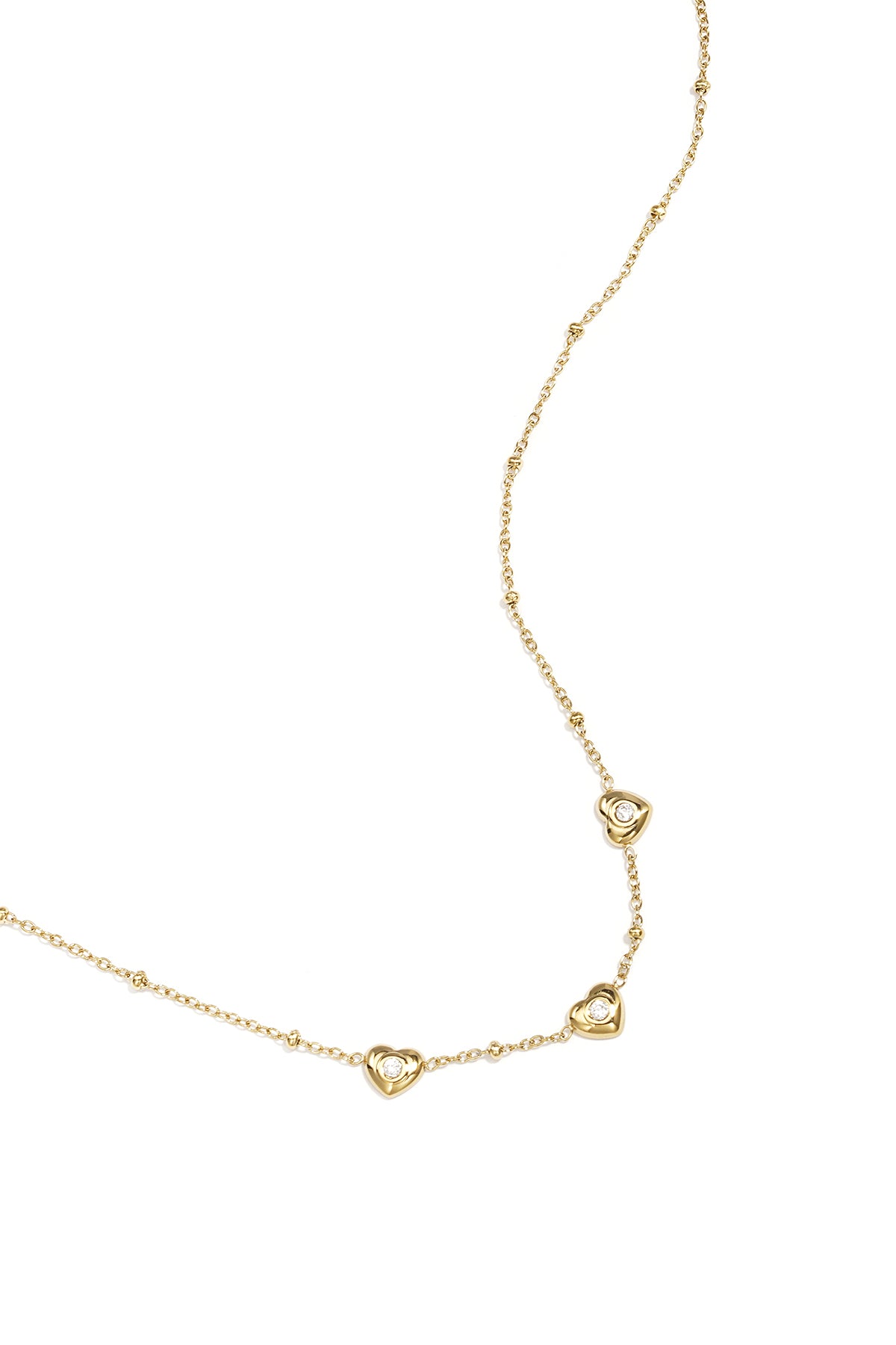 Collana con perline e cuori con pietra