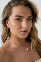 Collana con cuore pendente e perle