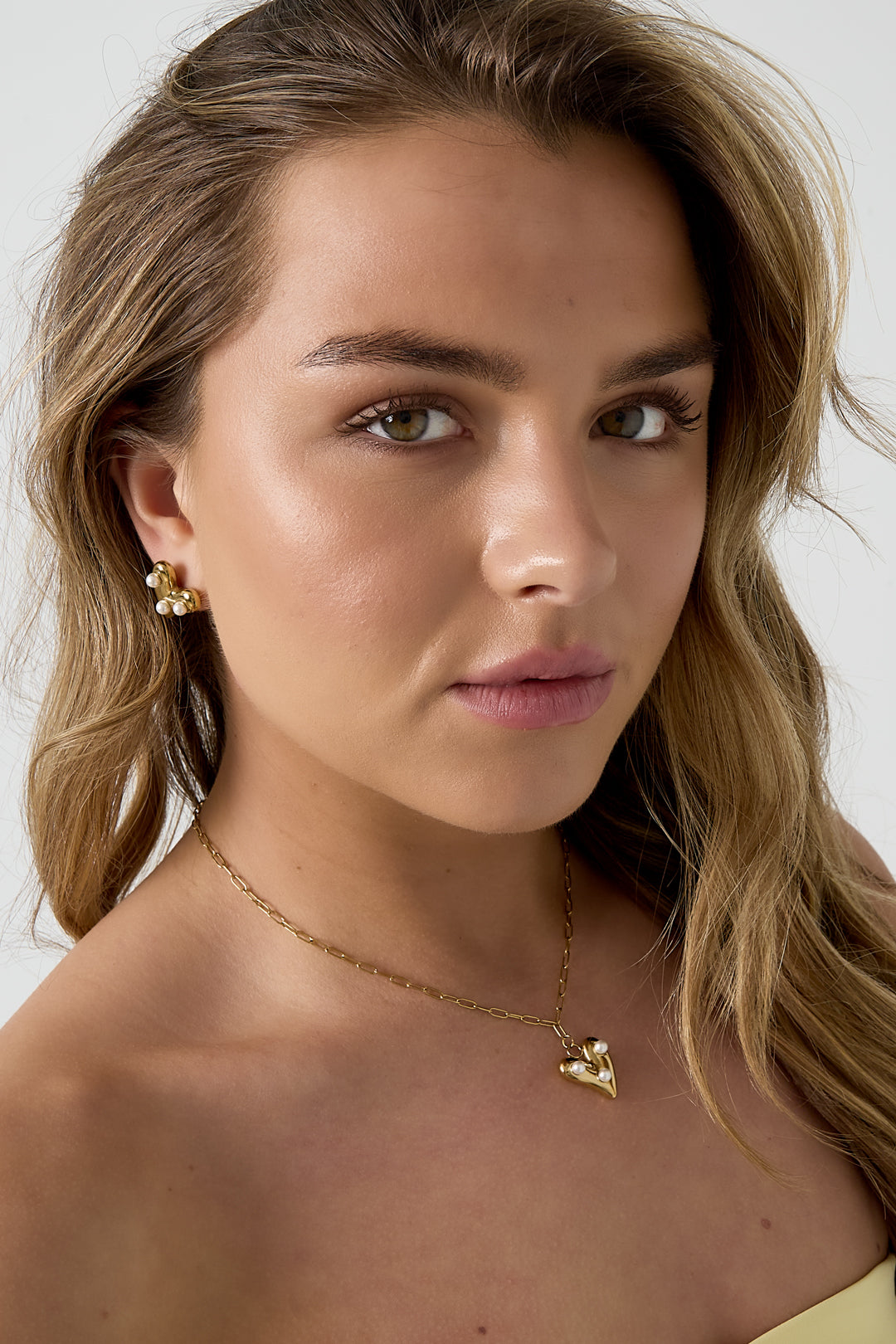 Collana con cuore pendente e perle