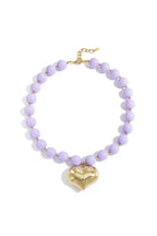 Collana di perline con cuore pendente