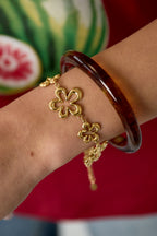 Bracciale con fiori giocosi a forma di corallo di varie dimensioni