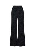 Pantaloni in rete con stampa floreale in pelle scamosciata pensati per abbinarsi