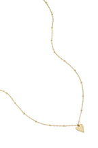 collana con palline e ciondolo a cuore