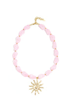 Collana di perline con ciondolo a forma di sole