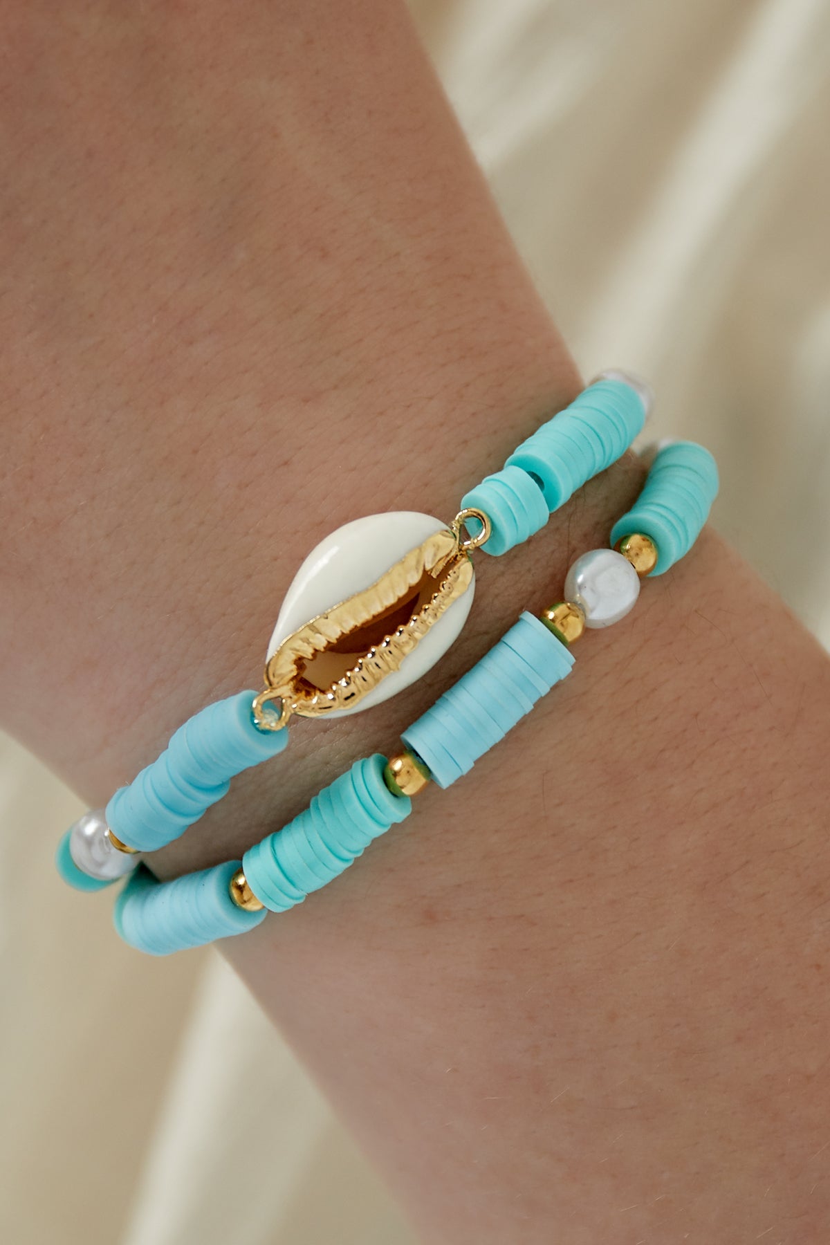 Bracciale con conchiglia in fiore