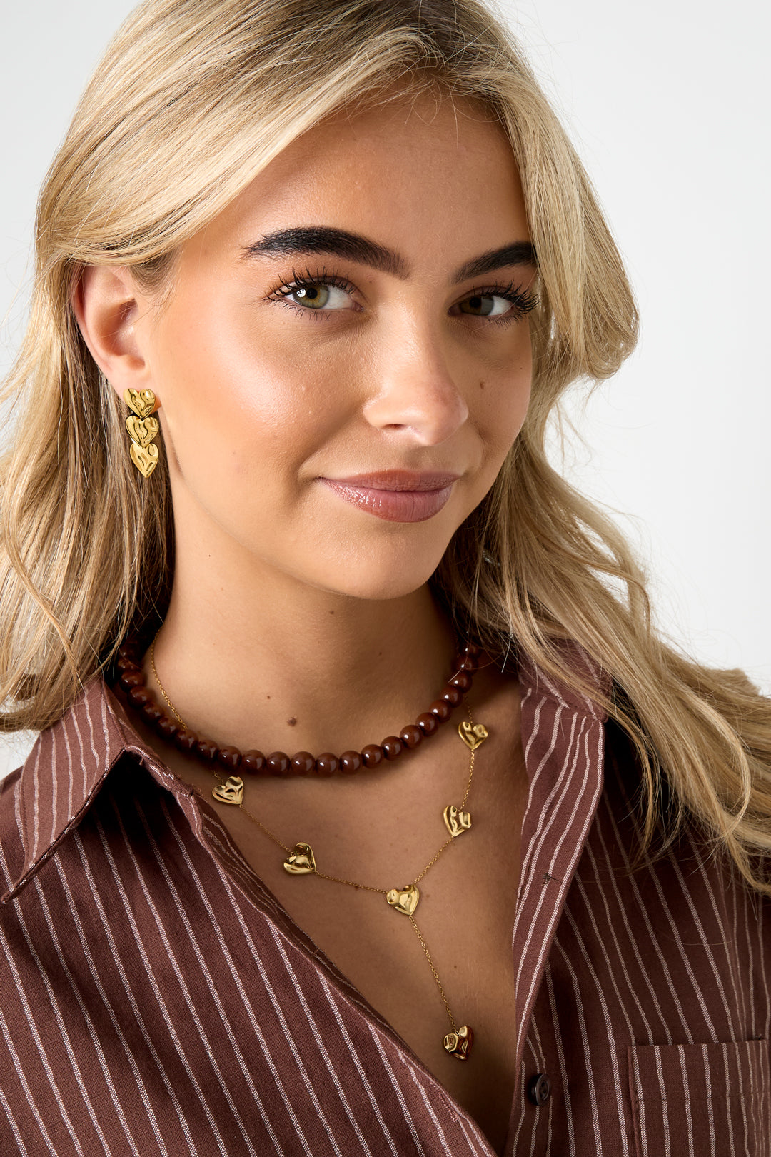 Collana a forma di Y con cuori ondulati