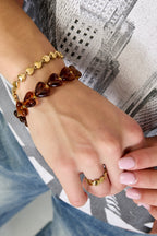 Bracciale elastico con perline a forma di cuore