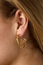 Orecchini a doppio cerchio con twist