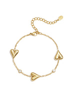Bracciale con tre cuori massicci e pietre