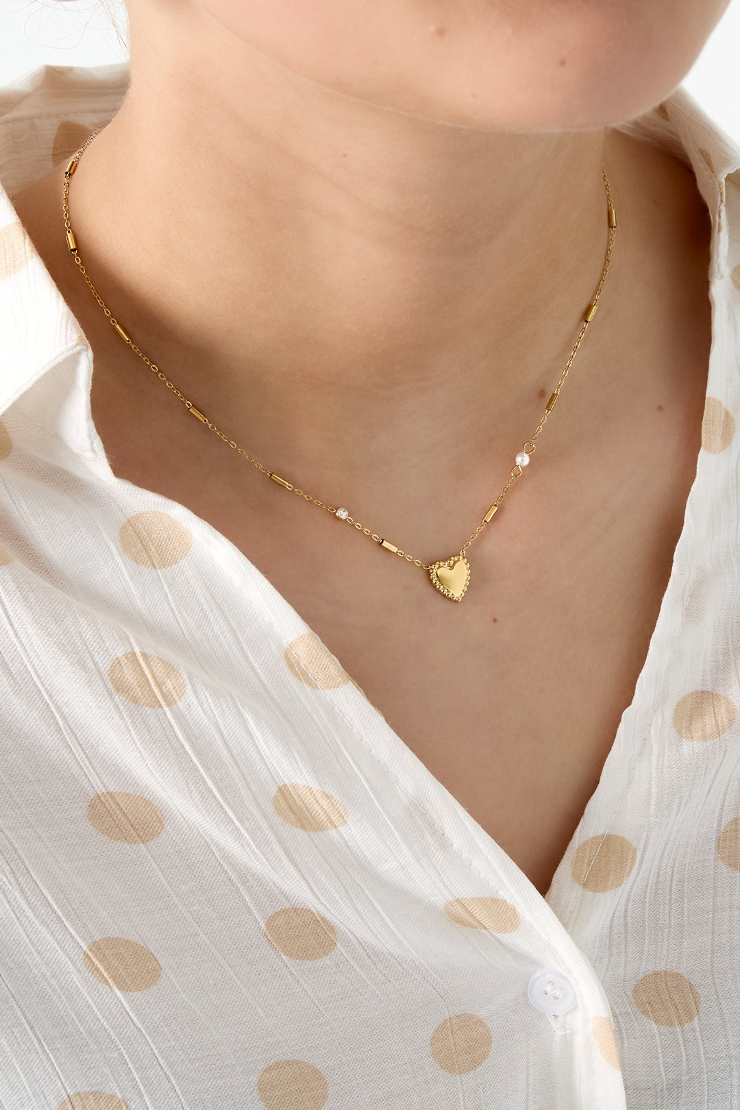 Collana con perla, pietra e cuore vistoso