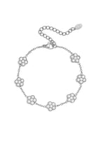 Elegante bracciale con fiori impreziositi da zirconi.