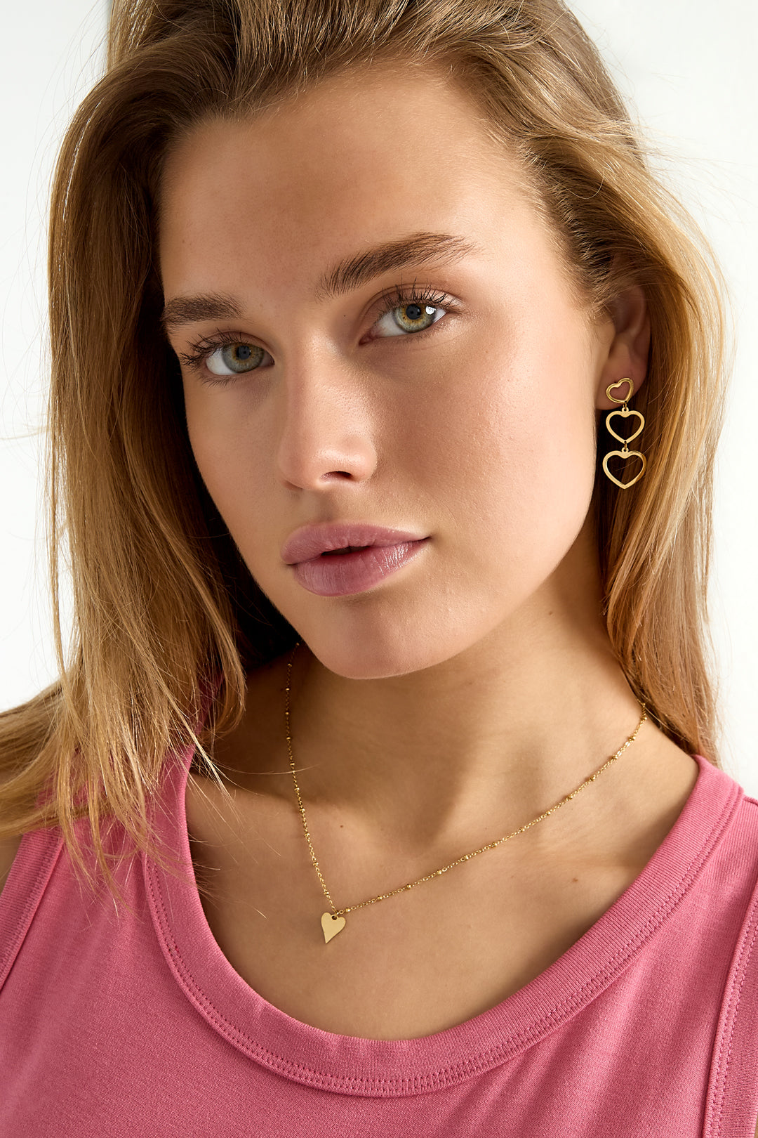 collana con palline e ciondolo a cuore
