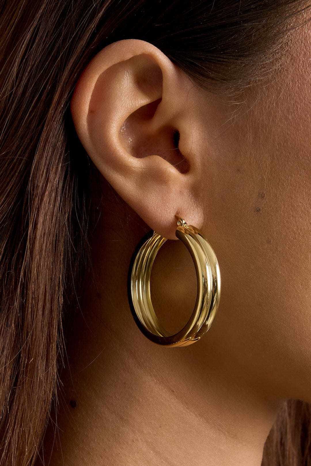 Orecchini a cerchio a coste Gold Stainless Steel