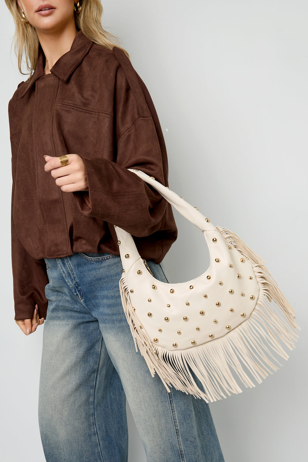 Borsa a mano borchiata