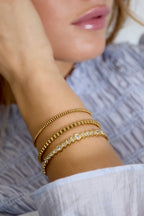 Bracciale rigido con pietre rotonde