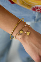 Bracciale con ciondoli a forma di trifoglio e perline