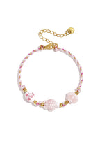 Bracciale con perline a forma di tartaruga e conchiglia e motivo a corda
