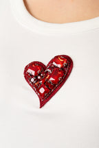 Top con cuore lucido