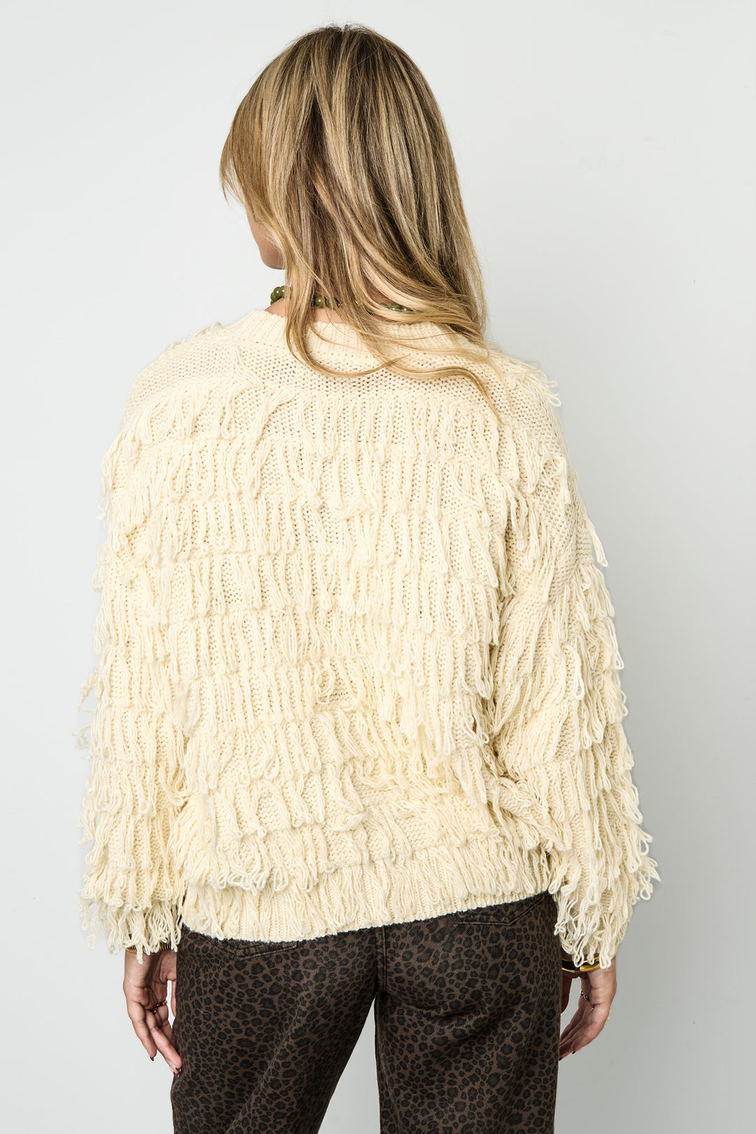 Maglione lavorato a maglia con frange