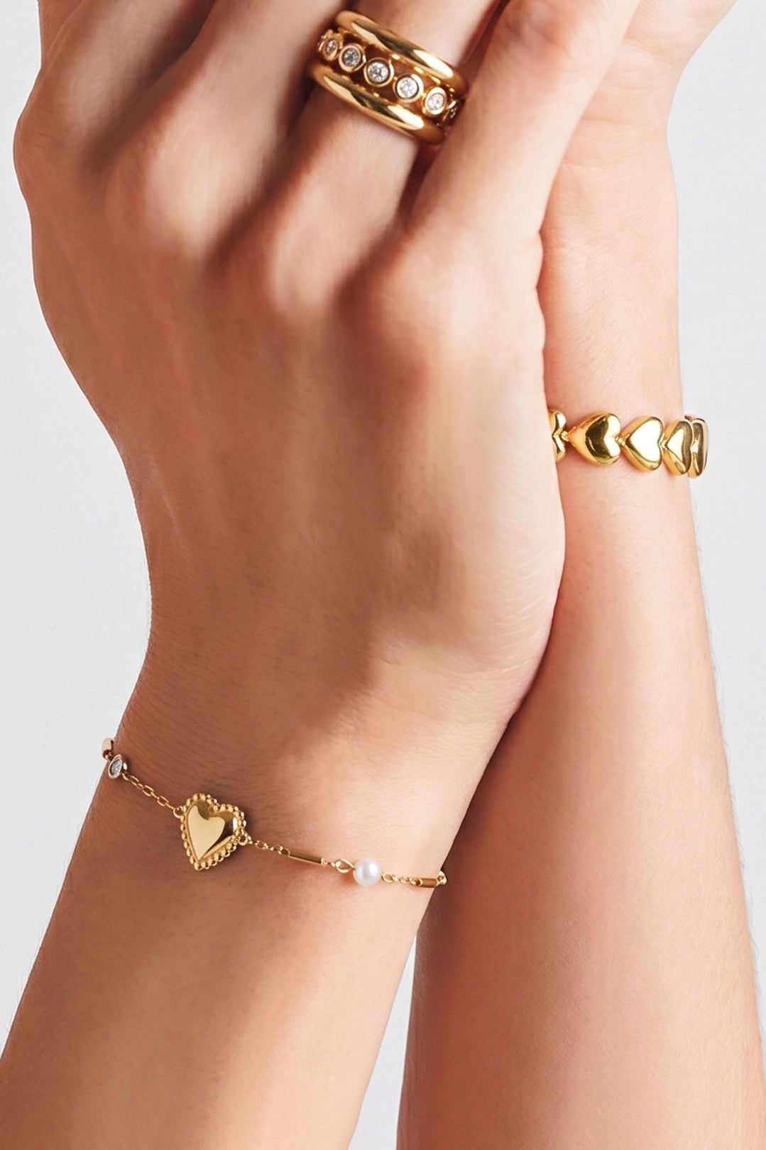 Bracciale con perla, pietra e cuore decorativo