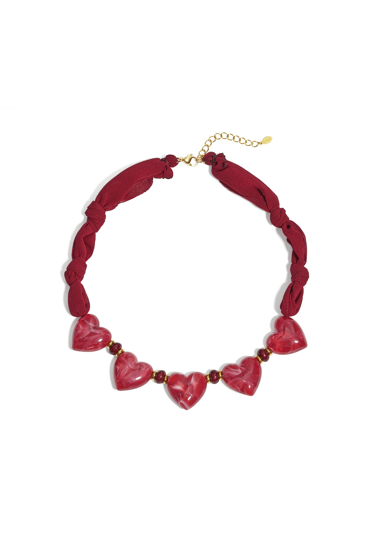 Collana in tessuto con perline a forma di cuore
