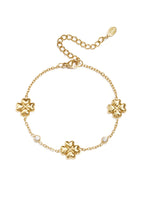 Bracciale a forma di trifoglio con pietre alternate