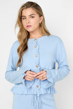 Il cardigan con volant amorevole