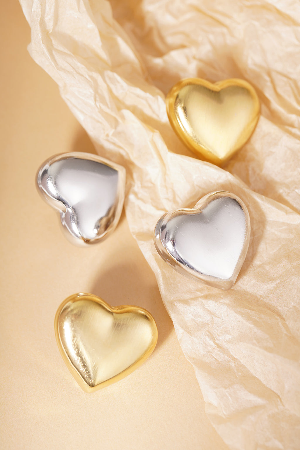 Orecchini a bottone a forma di cuore morbido