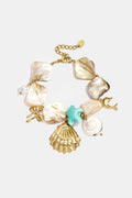 Bracciale con conchiglie, ciondoli marini, perline dorate e blu