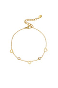 bracciale con ciondoli a forma di cuore e diamanti
