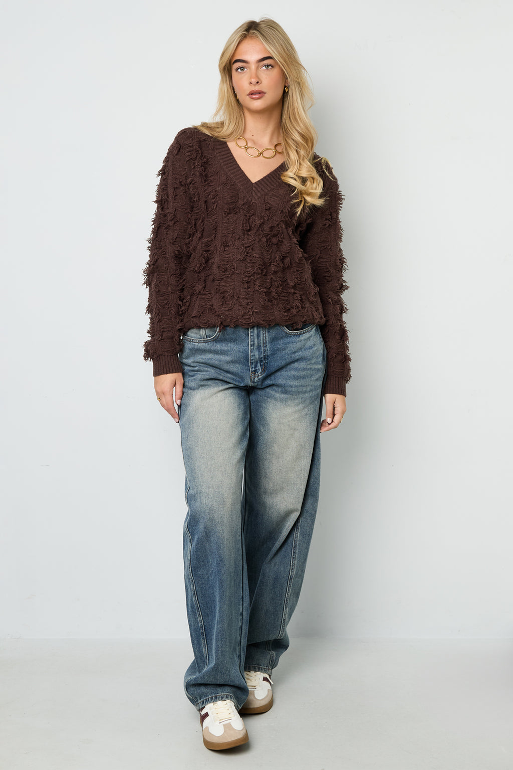Maglione a V con frange