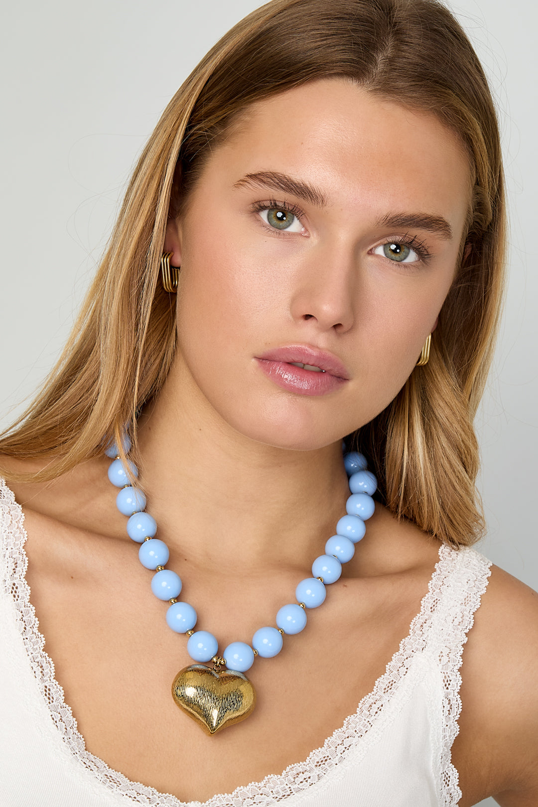 Collana di perline con cuore pendente