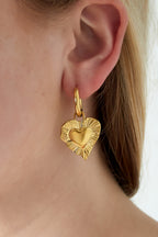 Orecchini a forma di cuore radioso
