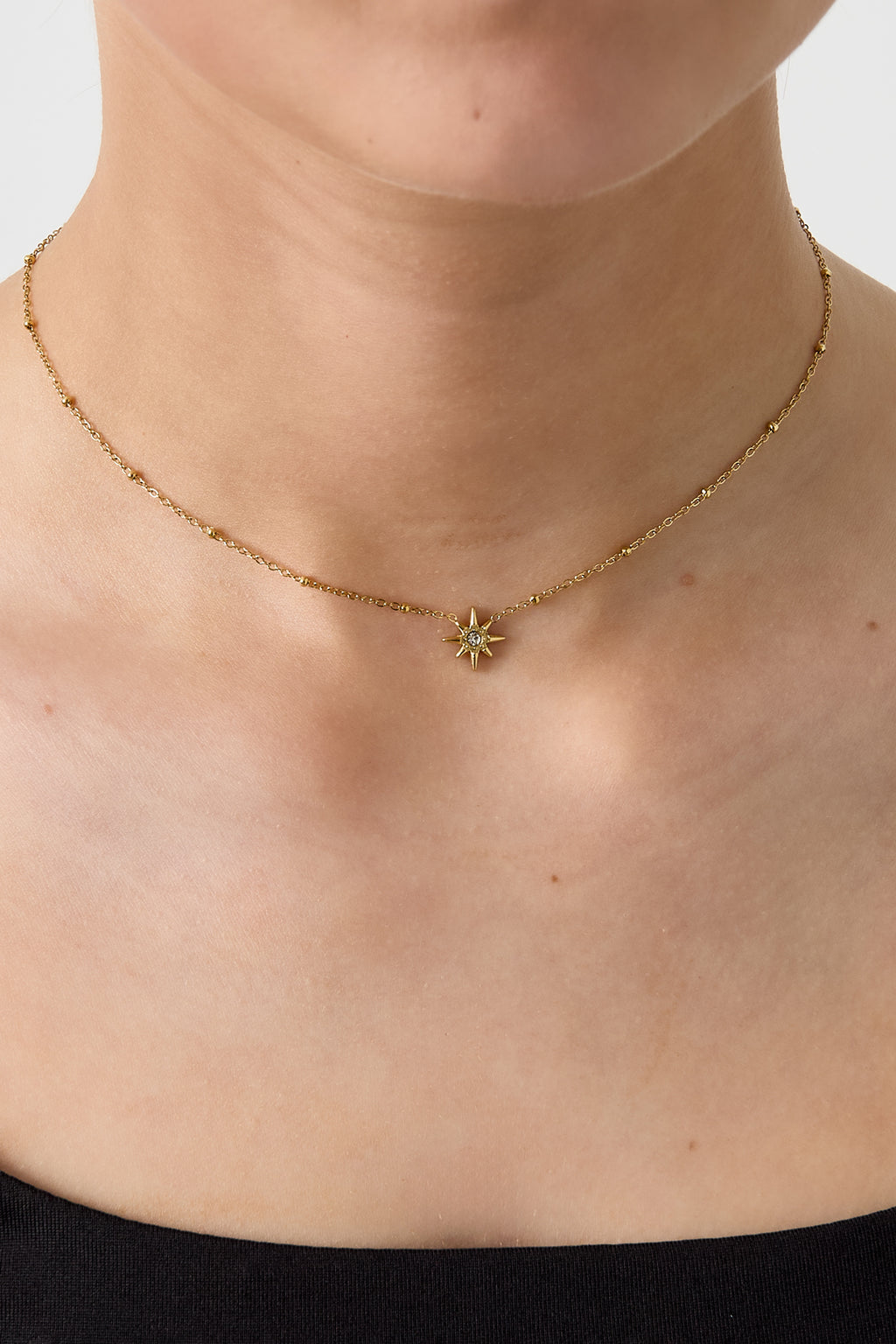 Collana con perline e stella cadente