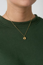 Collana con ciondolo a forma di ciambella